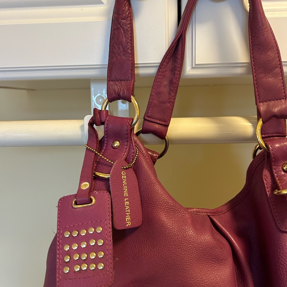 Elegant raspberry & plum color and Gold Shoulder Bag with Structured Design